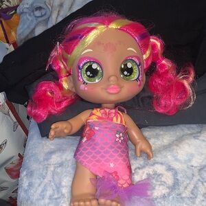 Vibrant Pink-Haired Doll with Colorful Outfit